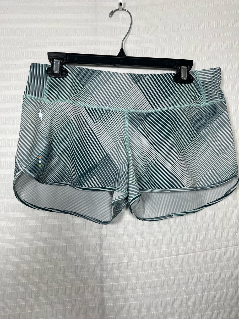 Smartwool Women’s Athletic Stripe Run Shorts in Teal size Small